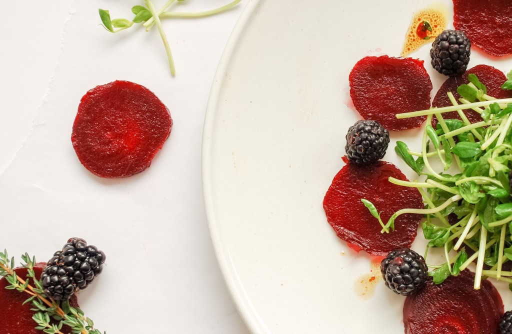 Beet Carpaccio: Beautiful beets accented with tangy blackberries and aromatic thyme. This gluten free and vegan appetizer is sure to impress! || fooduzzi.com