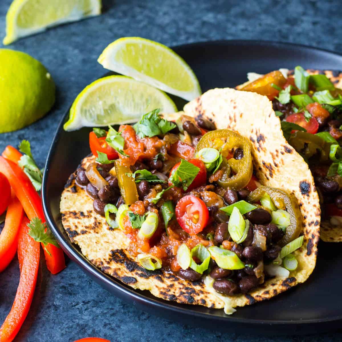 Black Bean Tacos with Vegan Creamy Slaw - Fooduzzi